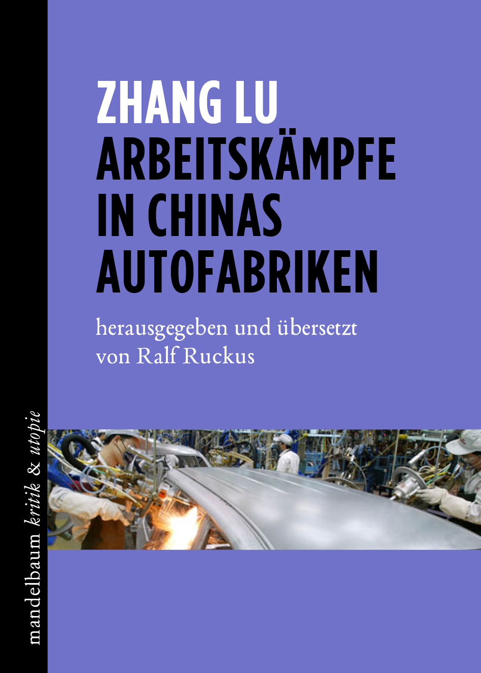 Das Cover ist zu einem großen Teil in einem lavendelfarbenen Lila, auf der unterenHälfte sieht man eine Szenerie aus einer Automobilfabrik. Mechanik überwiegt.